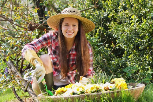 Professional gardeners working on a garden maintenance project in Beddington