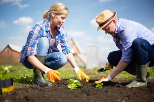 Expert advising on plant selection at Gardeners Brockley