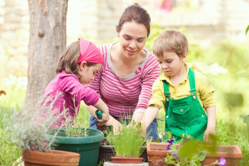 Professional gardener designing a garden layout in Friern Barnet